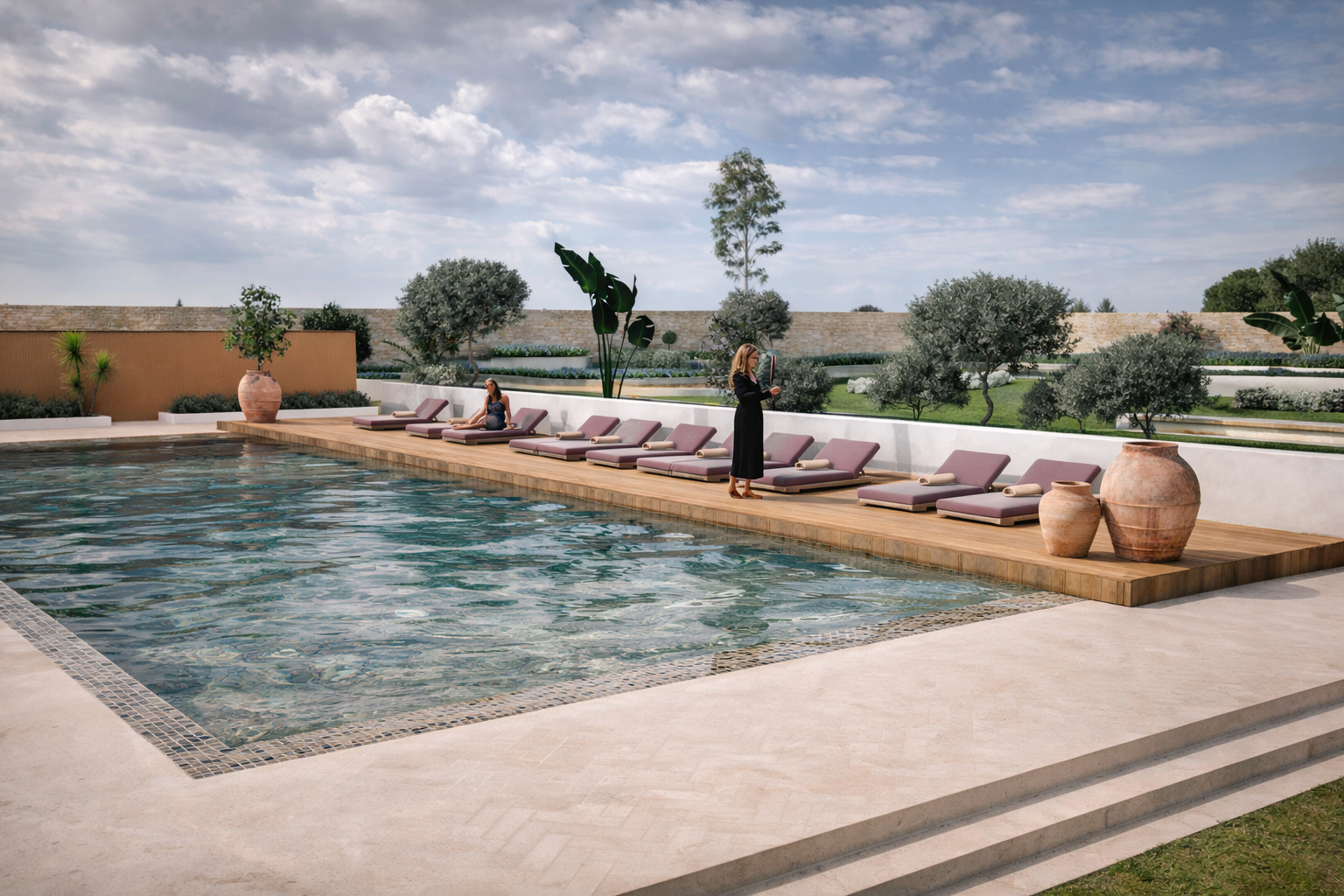 Piscine extérieure bordée de transats prune sur une terrasse en bois, jarres en terre cuite, oliviers et jardin paysager clos de murs en pierre